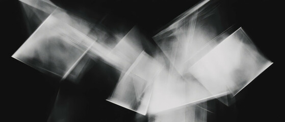 Bright highlights create dynamic overlay texture on a bold black background enhancing contrast