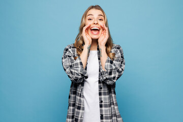 Young woman wears checkered grey shirt casual clothes scream sharing hot news about sales discount...