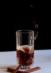 pouring red tea in a glass