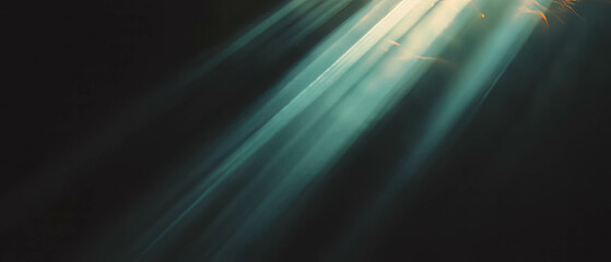 Bright rays of sunlight creating a warm atmosphere against a dark background