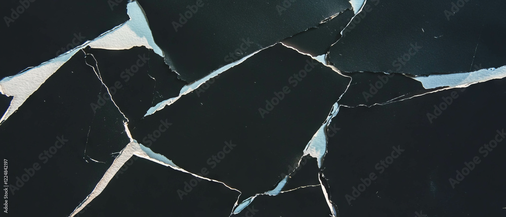Poster torn edges paper texture with distressed look over black background for creative design