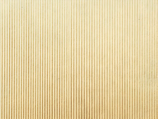 Beige Corrugated Metal Texture Background with Vertical Lines and Subtle Imperfections
