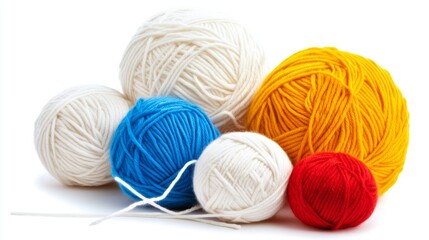 Multicoloured skeins of yarn for bright creativity on a white background. Handmade concept