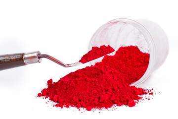 Cadmium Red, Vibrant Red Powder Spills From a Container on a White Surface During Crafting