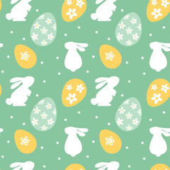 Easter bunny and eggs, spring.  Seamless pattern on green background. Vector.