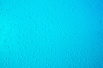 Drops on turquoise blue background. Water drops on bright blue background. Fresh blue colour. Abstarct wet texture bubbles. Raindrop, pure water droplets condensed for creative banner design.