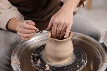 Hobby and craft. Woman making pottery indoors, closeup