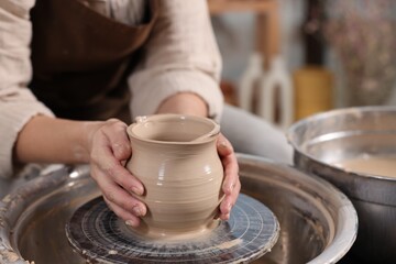 Hobby and craft. Woman making pottery indoors, closeup