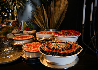 japanese food sushi, sushi on a plate, sushi with salmon and caviar, salmon and caviar, sushi with salmon,  table setting, haute cuisine, japanese food, raw salmon, buffet, restaurant, raw fish
