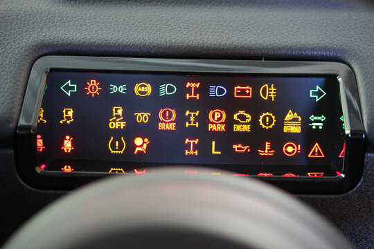 All warning lights illuminated on a new vehicle dashboard
