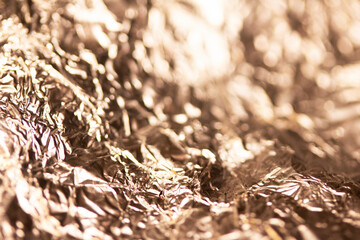 A Shiny Foil Crumpled in Sharp Crumpled Metallic Gloss Background  Gold