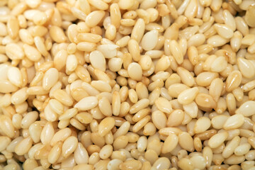 Macro Closeup of sesame seeds pile background