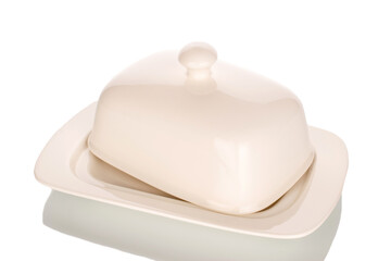 One ceramic container for butter, close-up, isolated on white background.