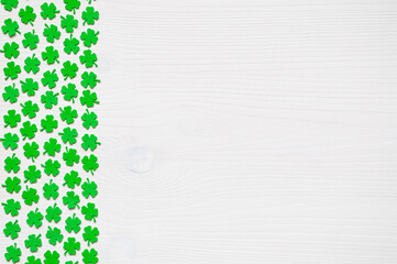 St Patricks Day background with green quatrefoils