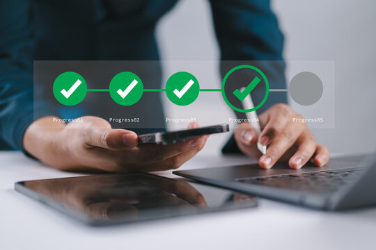 Corporate Progress and Task Management. Businessman Engaging with Mobile Interface Featuring Digital Check Marks, Highlighting Efficient Planning, Data Tracking, and Workflow Success