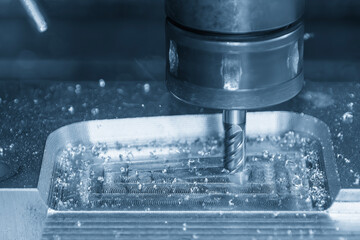 The CNC milling machine cutting press die part by solid bull nose end mill tool.