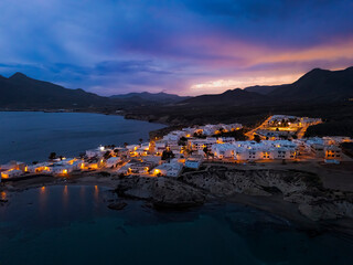 Aerial night view of La Isleta del Moro, Cabo de Gata-Níjar Natural Park, Almeria, Andalusia, Spain