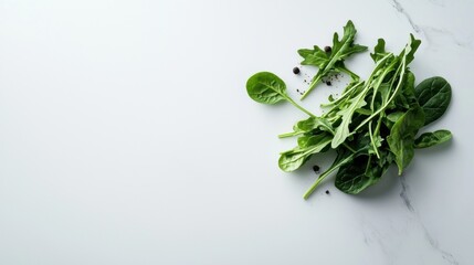 A bunch of green spinach leaves on a white background