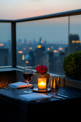 Romantic dining experience at a rooftop restaurant with stunning skyline views during twilight