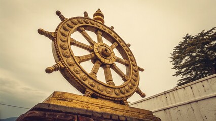 Vintage Gold Dharma Wheel: Isolated Buddhist Thammajak Symbol, Spiritual Serenity