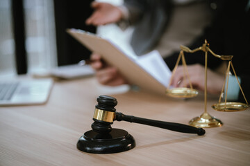 Lawyer's Hammer, Law Hammer, a symbol of justice and power. Legal documents, contracts and books surround him, representing court decisions, agreements and corporate laws in the business world.