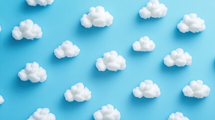 Fototapeta premium Whimsical Cotton Cloud Pattern on a Pastel Blue Background
