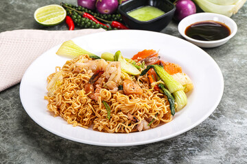 Asian cuisine - Fried noodles with seafood