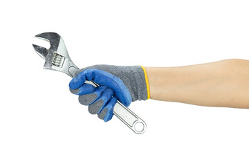 A man's hand wearing a blue work glove is holding an adjustable wrench, isolated on a white background with a clipping path.