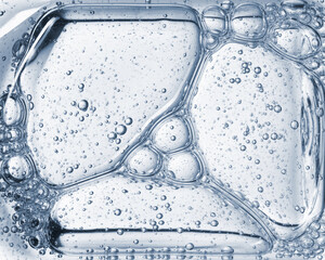 Clear cosmetic gel serum oil bubble texture Hyaluronic skin care moisturizer product sample with bubbles macro