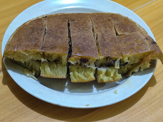 Sweet martabak.
Sweet martabak is a traditional Indonesian food that tastes sweet and savory.