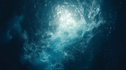 Fototapeta premium Abstract underwater scene with bright light source, illuminating particles in dark blue water. Glowing particles and a dramatic light beam create a