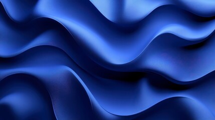 Fototapeta premium Abstract image of undulating, textured blue fabric. Deep blue tones create a dramatic and luxurious feel. The surface is subtly textured, adding