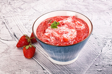 Strawberry soup with strachatella cheese