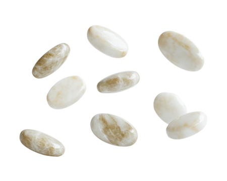 A collection of oval-shaped stones with a mix of white and beige hues.
