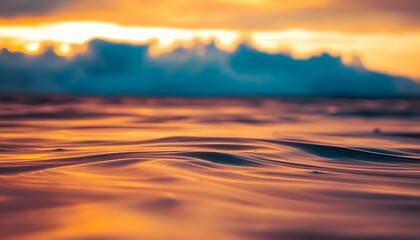 A dreamy abstract landscape with soft, blurred gradients resembling sunrise colors, mixed with flowing textures like clouds or water