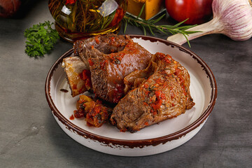 Baked beef ribs with vegetables