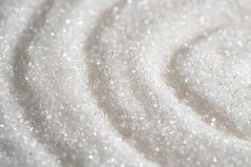 White loose sugar spinning. Sugar texture