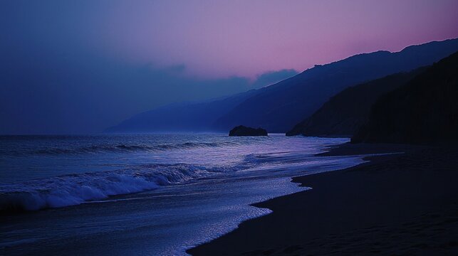 Serene twilight beach scene with dark sand, gentle waves, and distant mountains under a purple sky.