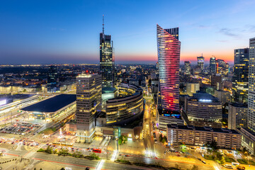 Naklejka premium Warsaw skyline skyscraper in downtown by night in Warsaw, Poland