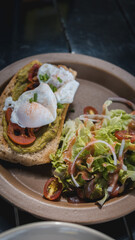 Western brunch, avocado toast next to the sea