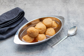 Nolen Gurer Rosogolla, A Sweet Bengali Delicacy Made with Date Palm Jaggery, Perfect for Festivities and Traditional Occasions
