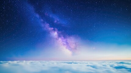 Milky Way over clouds at night, aerial view, scenic background, travel photography