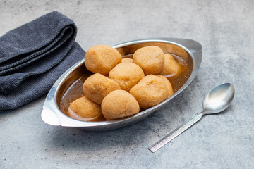 Delightful Nolen Gurer Rosogolla, A Sweet Bengali Tradition with Rich Flavors and Unique Date Palm Jaggery Essence
