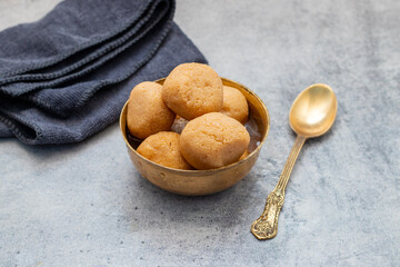 Delightful Nolen Gurer Rosogolla, A Sweet Bengali Tradition with Rich Flavors and Unique Date Palm Jaggery Essence
