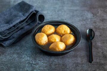 Delightful Nolen Gurer Rosogolla, A Sweet Bengali Tradition with Rich Flavors and Unique Date Palm Jaggery Essence
