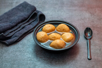 Delightful Nolen Gurer Rosogolla, A Sweet Bengali Tradition with Rich Flavors and Unique Date Palm Jaggery Essence