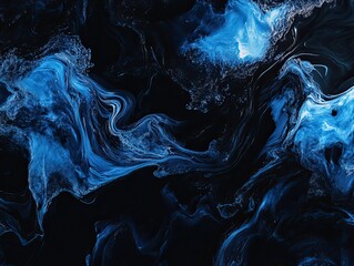 Abstract blue and black ink patterns flowing in a fluid dynamic texture background