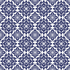 Elegant Blue and White Tile Pattern with Geometric Floral Arrangements