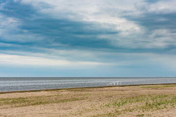 Storm clouds over an abandoned sea beach