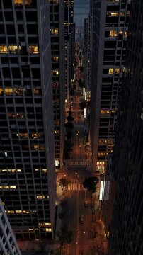 A vertical perspective captures an urban canyon framed by towering skyscrapers on both sides, evoking mystery and enigma. Dark, moody tones with dramatic lighting. Cinematic urban scenes.
